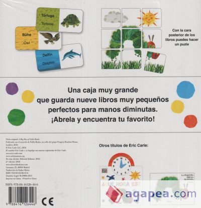 Una caja con muchos libros y un puzzle