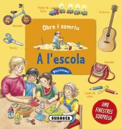 Portada de A l'escola